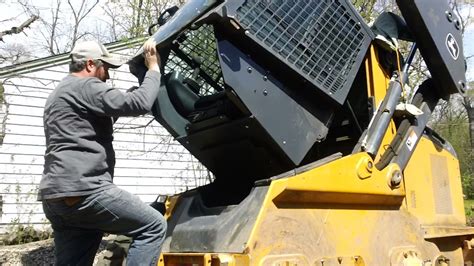 how to lift the cab on a case skid steer|How to raise the cab. TL10 .